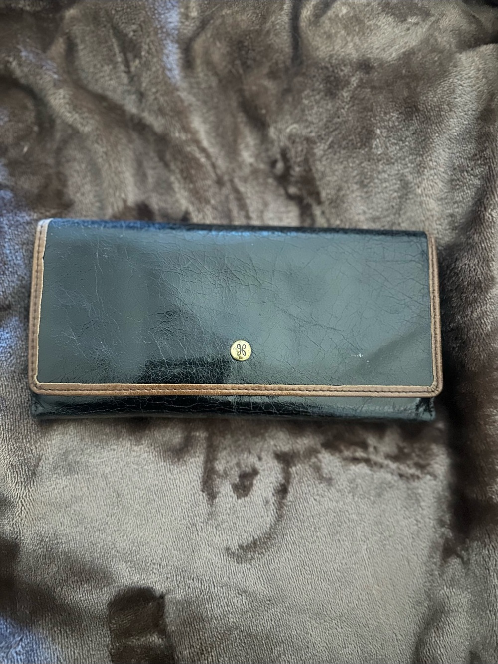 Black Leather Wallet with Brown Trim and Gold Logo